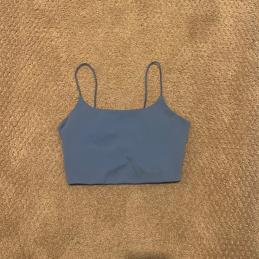 this top was never worn but it came too tight and i lost the tag